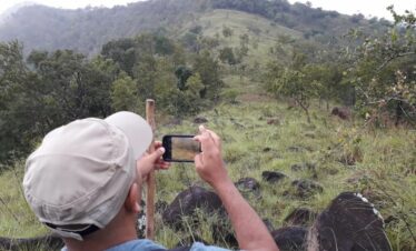 taking photographs during their trekking t ahaspokuna in sri lanka experiential journey