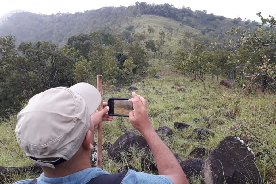 taking photographs during their trekking t ahaspokuna in sri lanka experiential journey